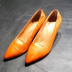 Tan leather pumps